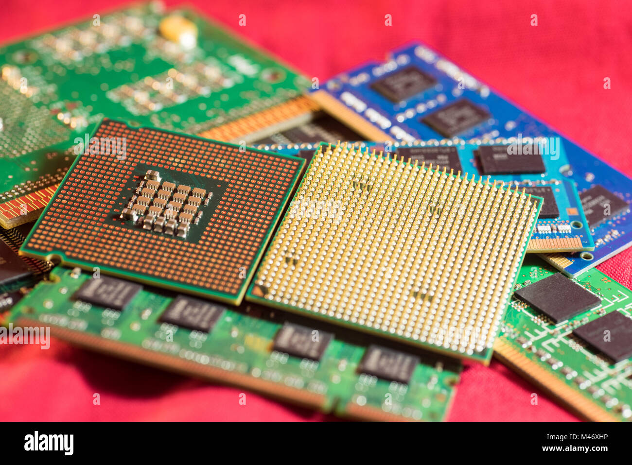 Two different types of CPUs on stacks of memory cards. Stock Photo
