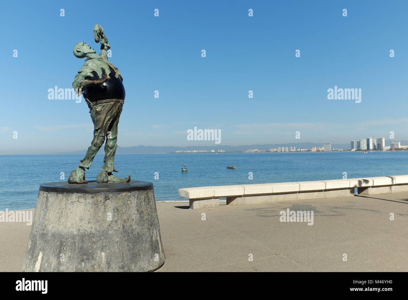'The subtle rock eater' (2006) by Jonas Gutierrez is a permanent fixture on the malecon in Puerto Vallarta, Mexico. Stock Photo