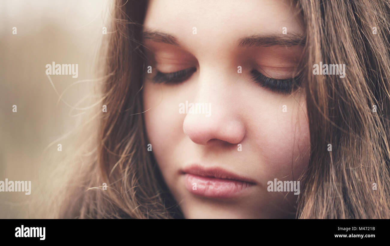 close up portrait of sad young girl Stock Photo - Alamy