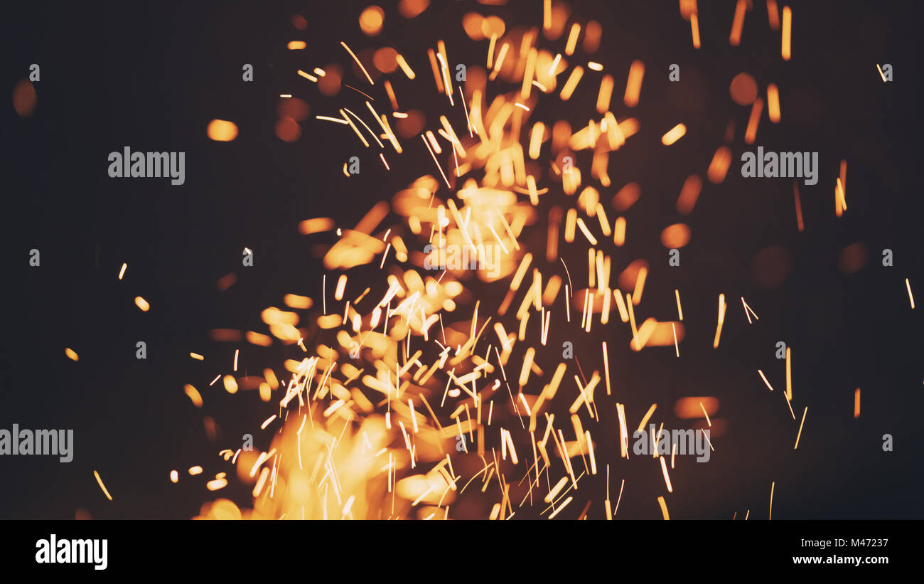 bonfire spark in the dark sky in night Stock Photo - Alamy
