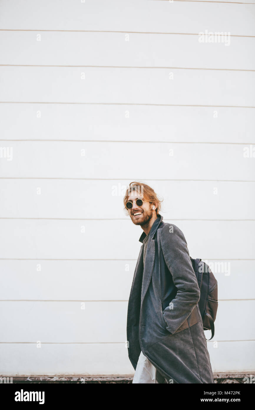Man walking away coat hi-res stock photography and images - Alamy