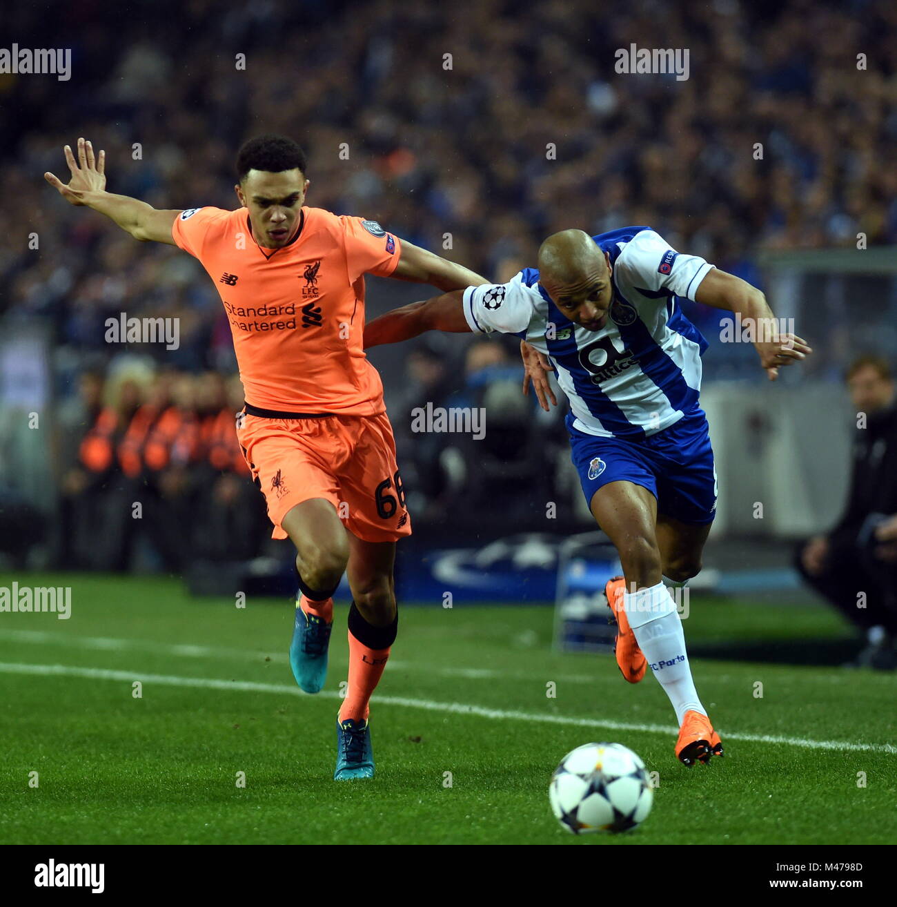 Porto. 14th Feb, 2018. Yacine Brahimi (R) of Porto vies with Alexander-Arnold of Liverpool during the European Champions League soccer match between FC Porto and Liverpool FC at Dragon stadium in Porto, Portugal on Feb. 14, 2018. Liverpool won 5-0. Credit: Zhang Yadong/Xinhua/Alamy Live News Stock Photo