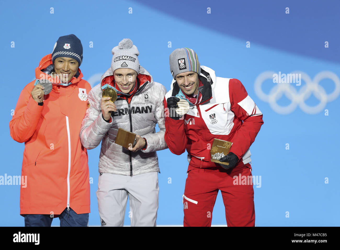 Pyeongchang, South Korea. 15th Feb, 2018. Gold medalist Eric Frenzel (C) from Germany, silver medalist Akito Watabe (L) from Japan and Lukas Klapfer from Austria pose for photos during the medal ceremony of individual gundersen NH/10KM event of nordic combined at Pyeongchang 2018 Winter Olympic Games at Medal Plaza, PyeongChang, South Korea, Feb. 15, 2018. Credit: Wu Zhuang/Xinhua/Alamy Live News Stock Photo