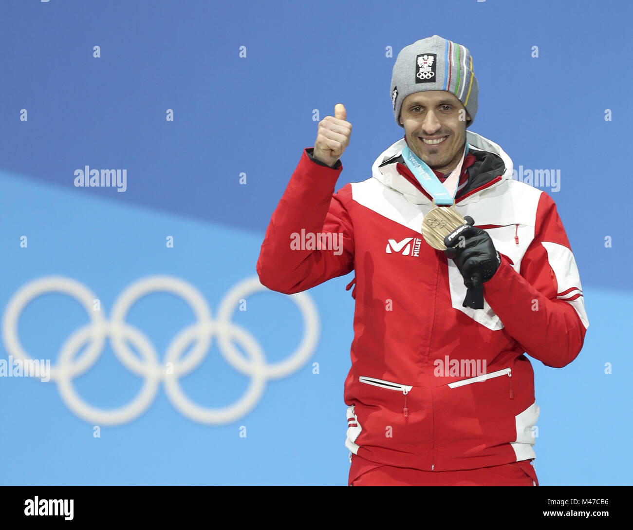 Pyeongchang, South Korea. 15th Feb, 2018. Bronze medalist Lukas Klapfer from Austria poses for photos during the medal ceremony of individual gundersen NH/10KM event of nordic combined at Pyeongchang 2018 Winter Olympic Games at Medal Plaza, PyeongChang, South Korea, Feb. 15, 2018. Credit: Wu Zhuang/Xinhua/Alamy Live News Stock Photo