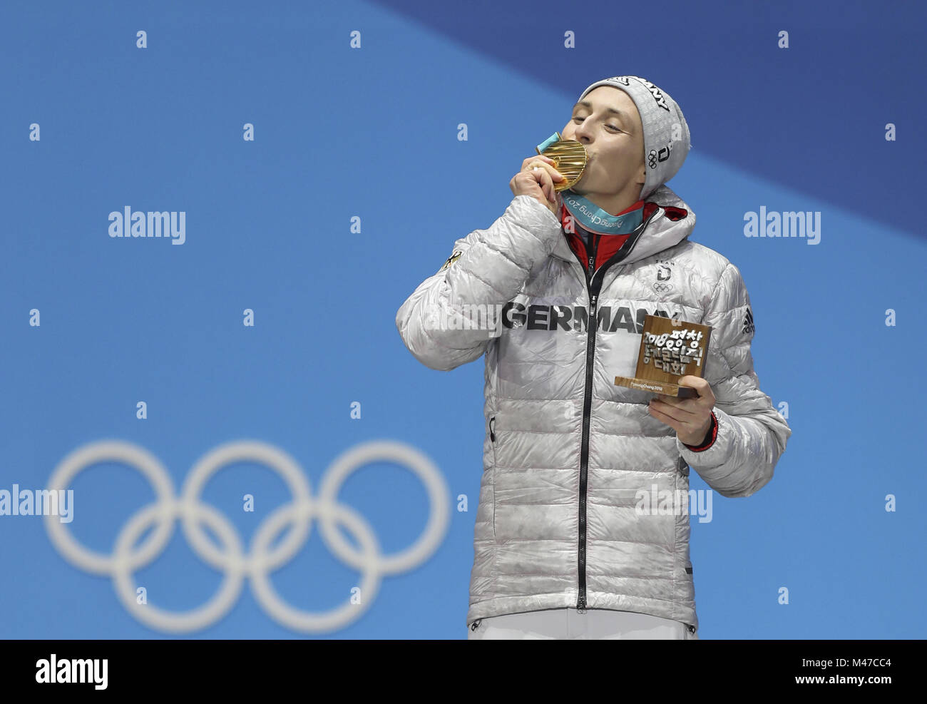 Pyeongchang, South Korea. 15th Feb, 2018. Gold medalist Eric Frenzel from Germany poses for photos during the medal ceremony of individual gundersen NH/10KM event of nordic combined at Pyeongchang 2018 Winter Olympic Games at Medal Plaza, PyeongChang, South Korea, Feb. 15, 2018. Credit: Wu Zhuang/Xinhua/Alamy Live News Stock Photo