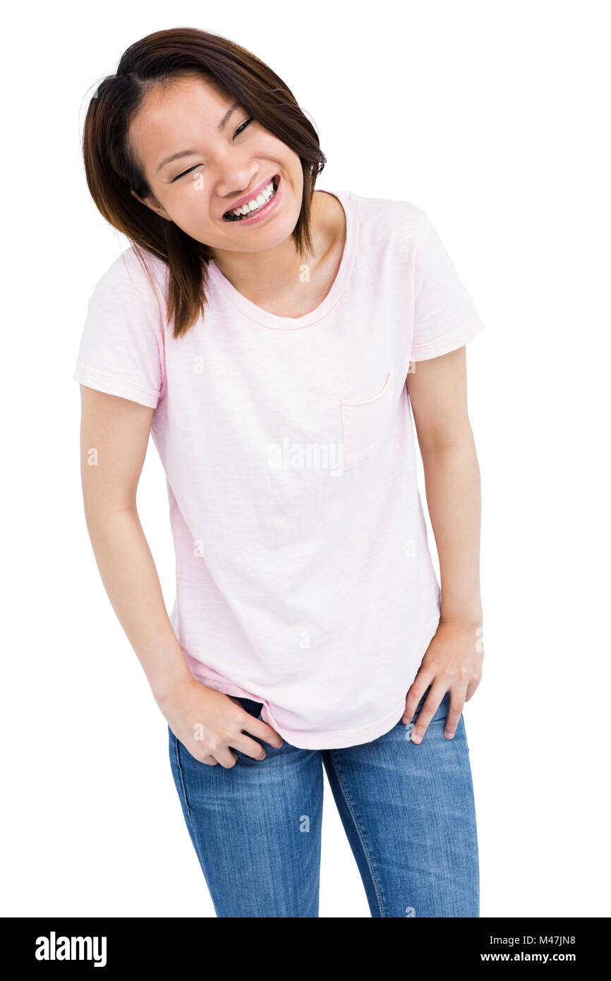 Cheerful young woman looking at camera and smiling Stock Photo - Alamy