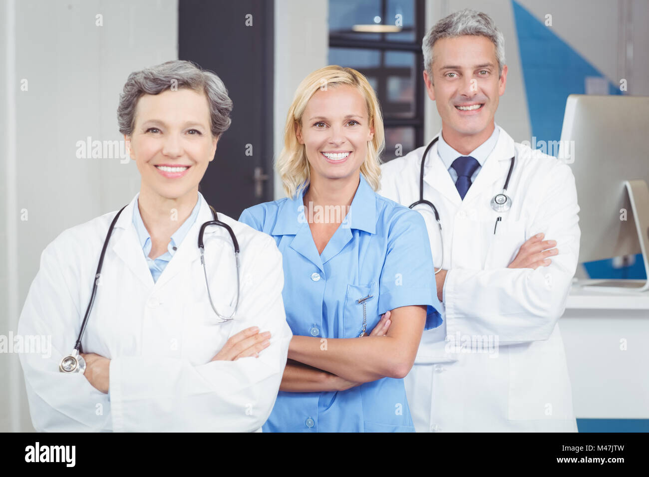 Doctor arms crossed team hi-res stock photography and images - Alamy