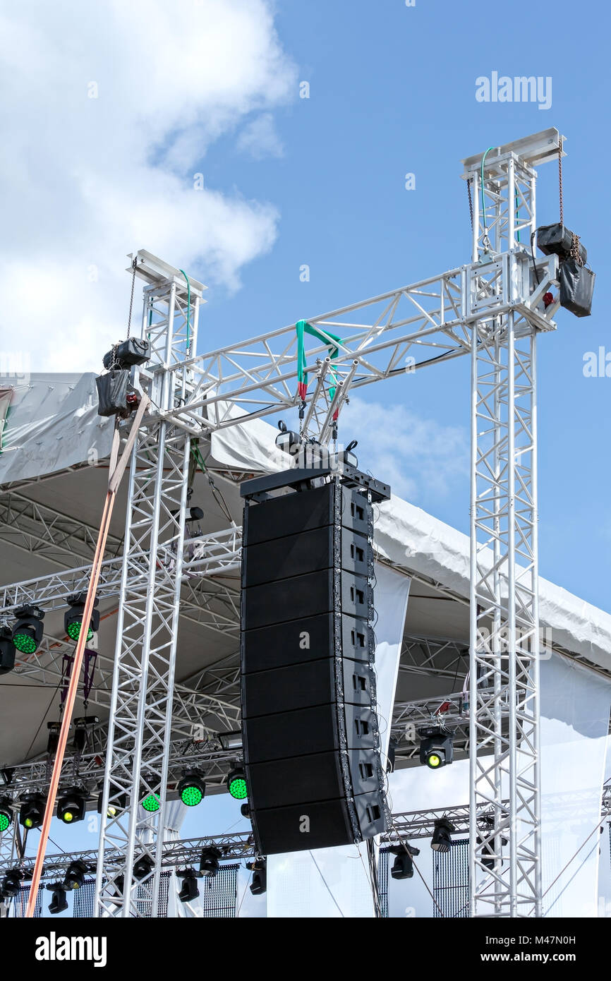 outdoor stage with lighting equipment and loudspeaker Stock Photo