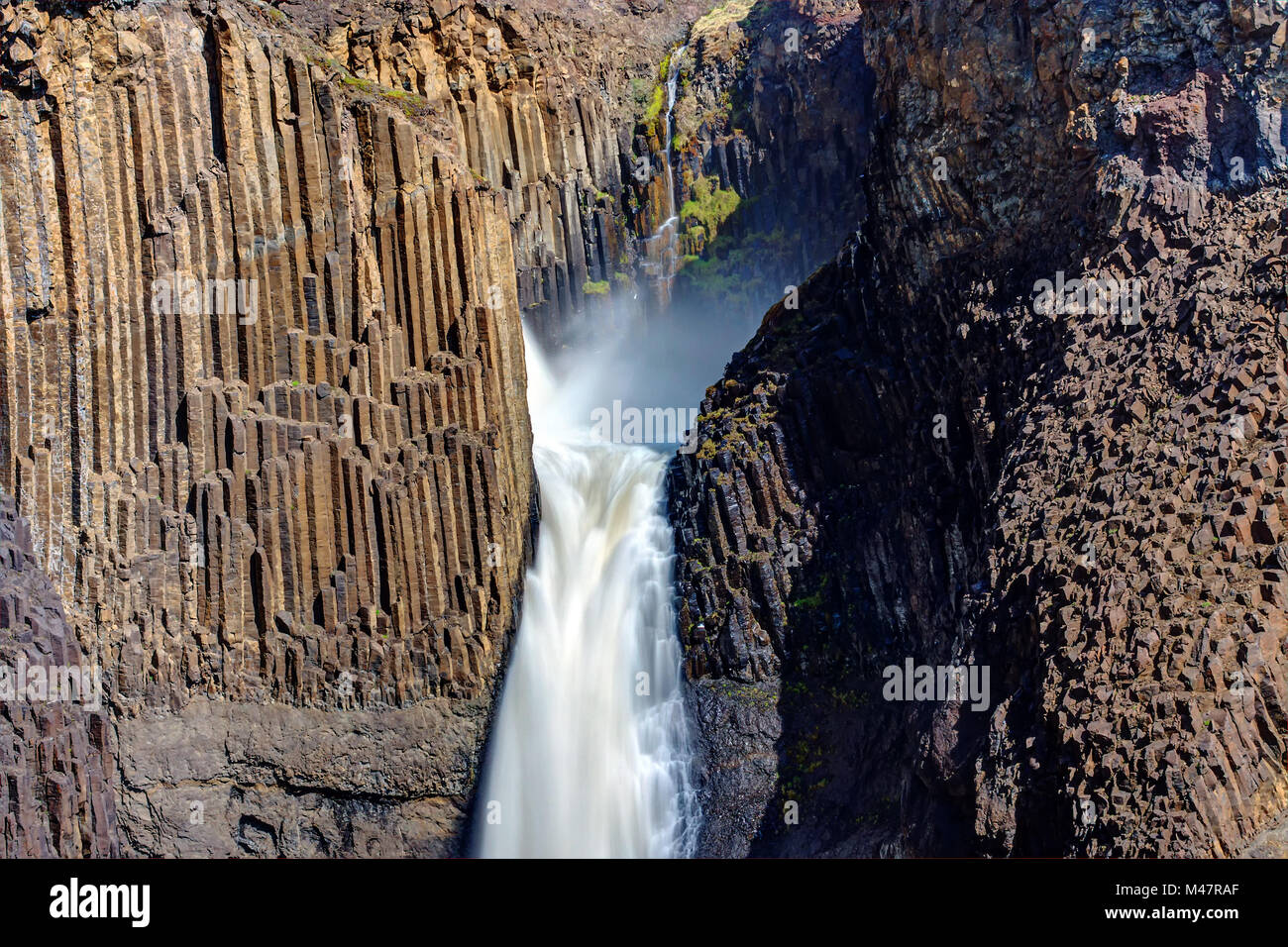 The Litlanesfoss waterfall in Iceland with its basaltic columns Stock Photo