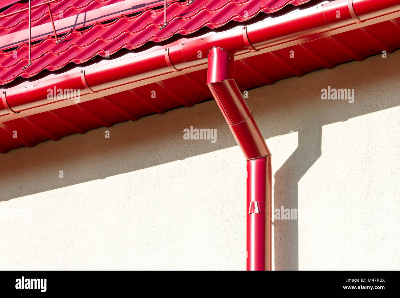 new red roof with gutter and snow guard Stock Photo