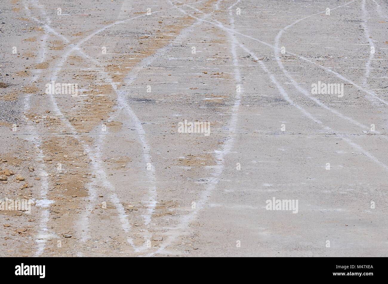 Concrete pavement with traces of the construction site Stock Photo