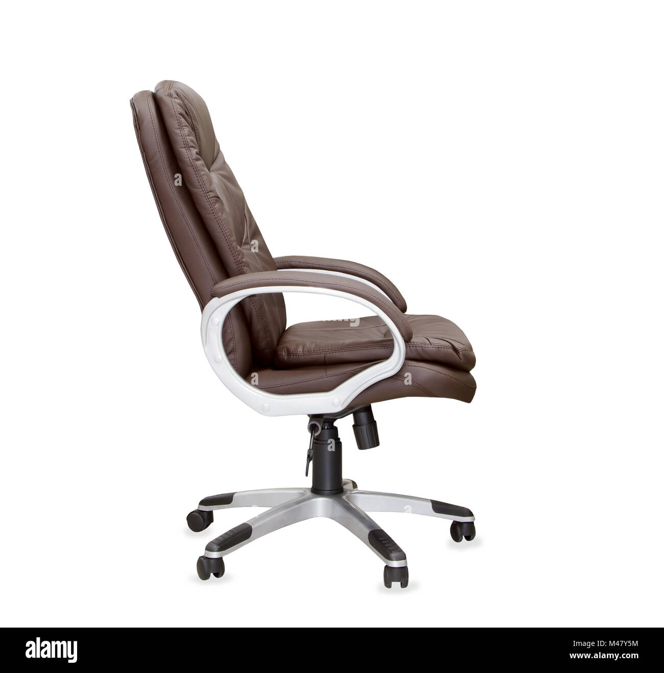 The profile view of office chair from brown leather. Isolated Stock Photo