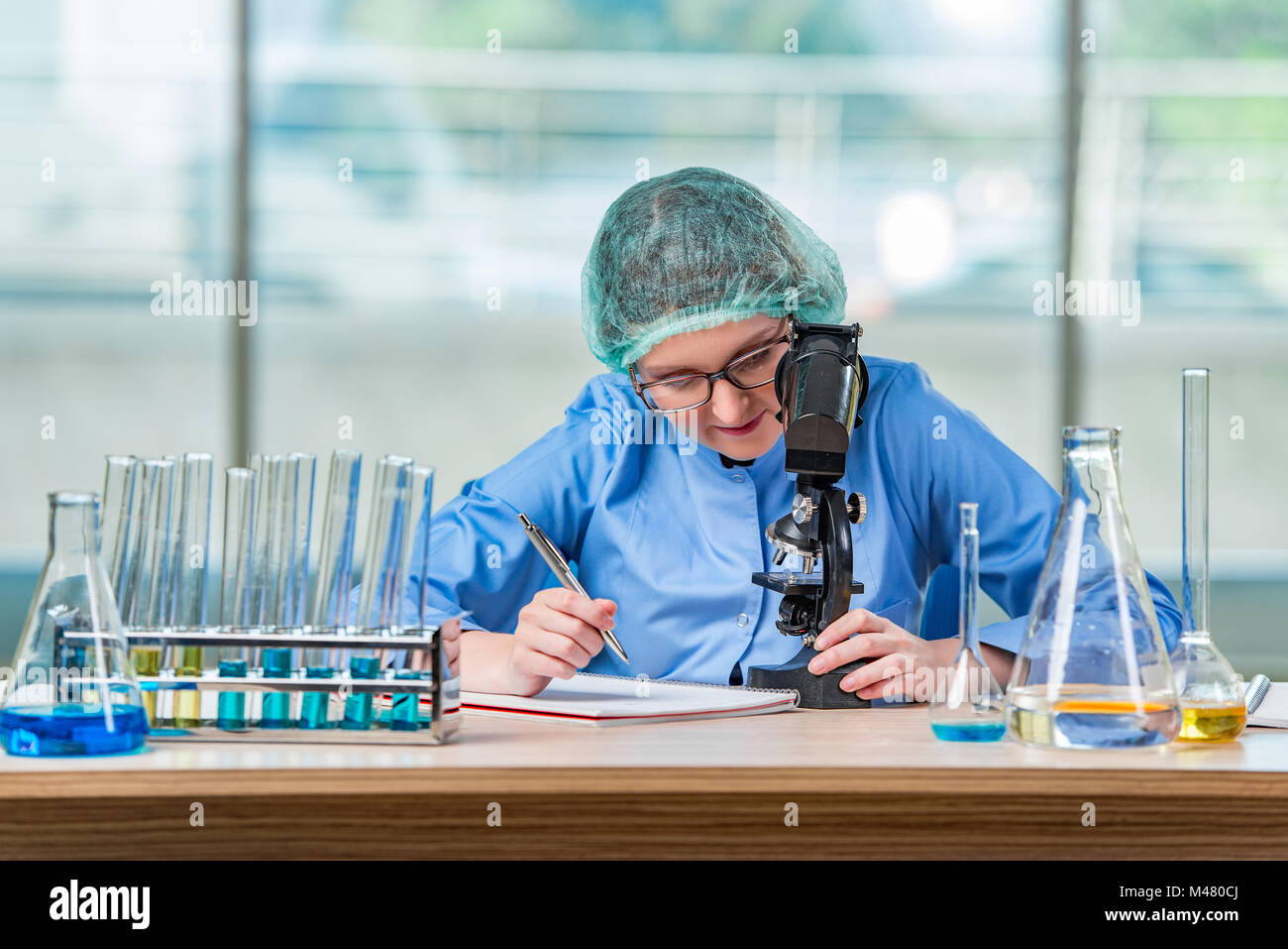 Engineering Or Lab Assistant Experienced lab assistant working on chemical solutions Stock Photo - Alamy