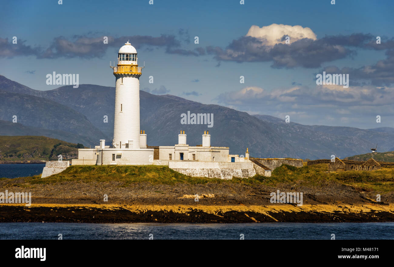 Lighthouse on Eilean Musdile near Oban in daylight, Scotland Stock Photo