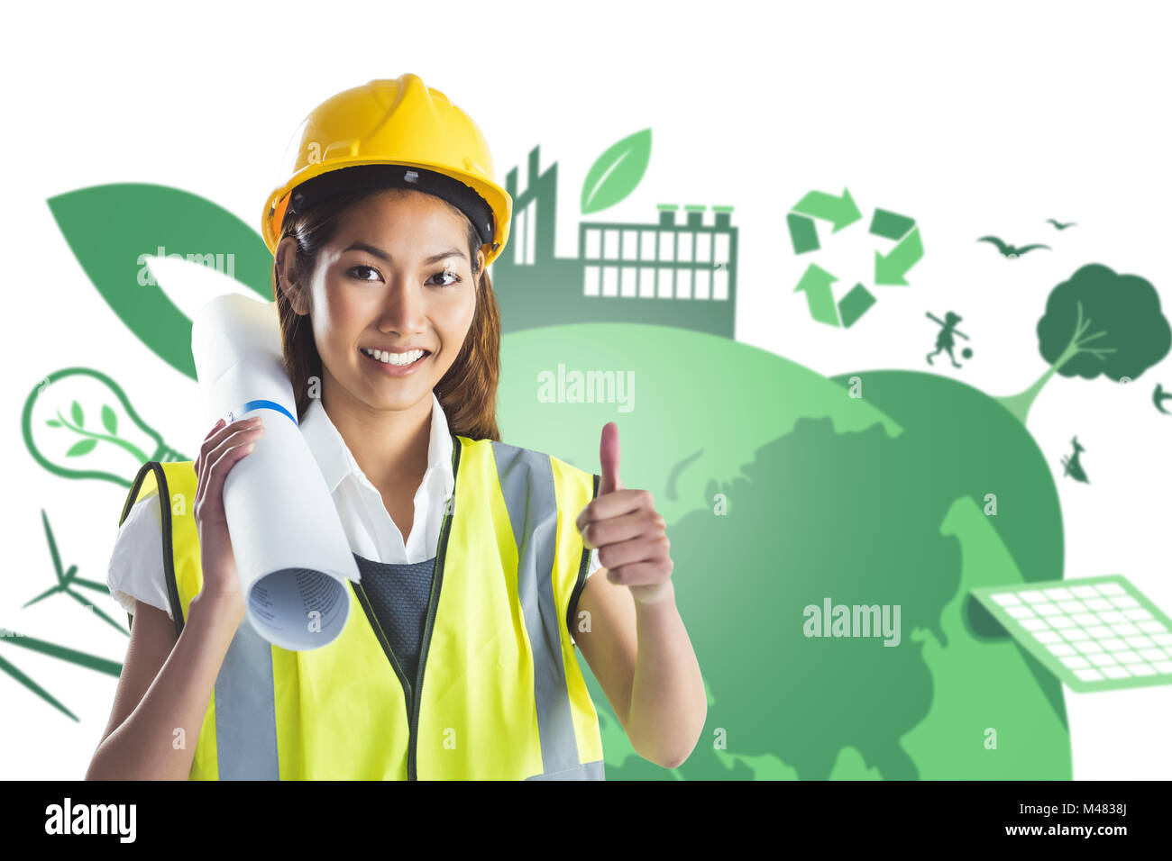 Composite image of architect woman with thumbs up Stock Photo