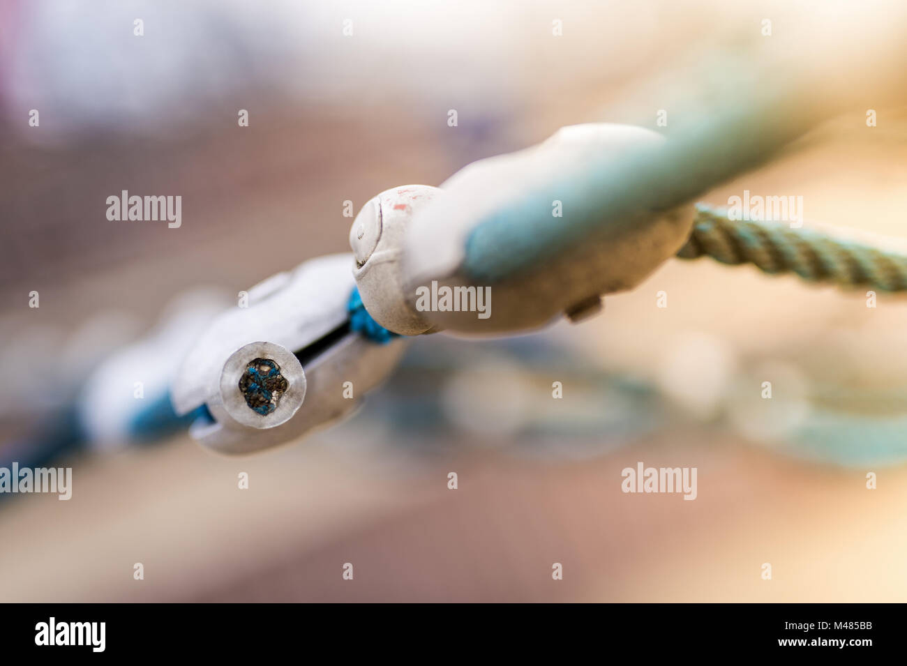 Connector of a network of ropes in a playground. Network. Stock Photo