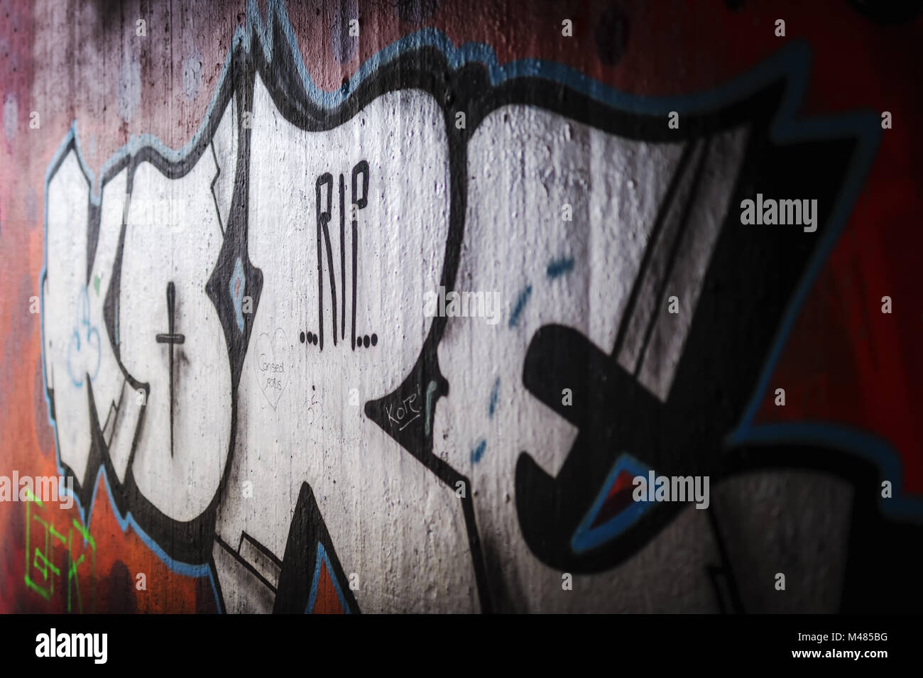 With Graffiti designed wall of an underpass in the backlight. Stock Photo