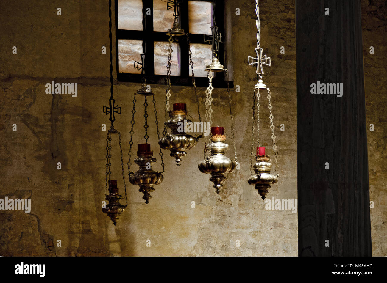 hanging candle holder at a Christian basilica Stock Photo Alamy