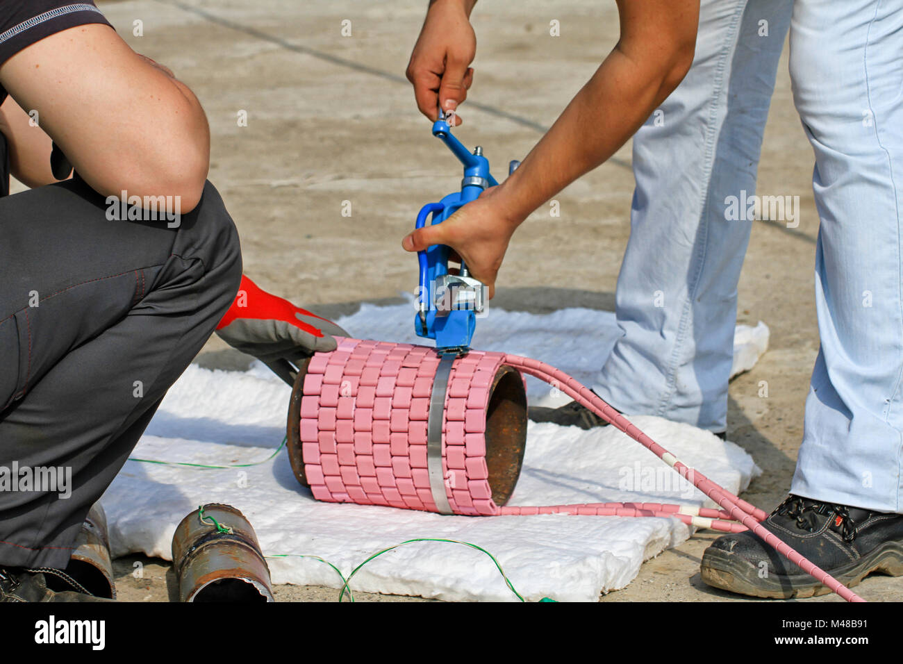 Preparation for conducting heat treatment on the weld Stock Photo