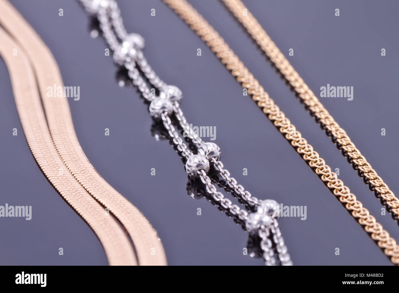 Silver and gold chains Stock Photo