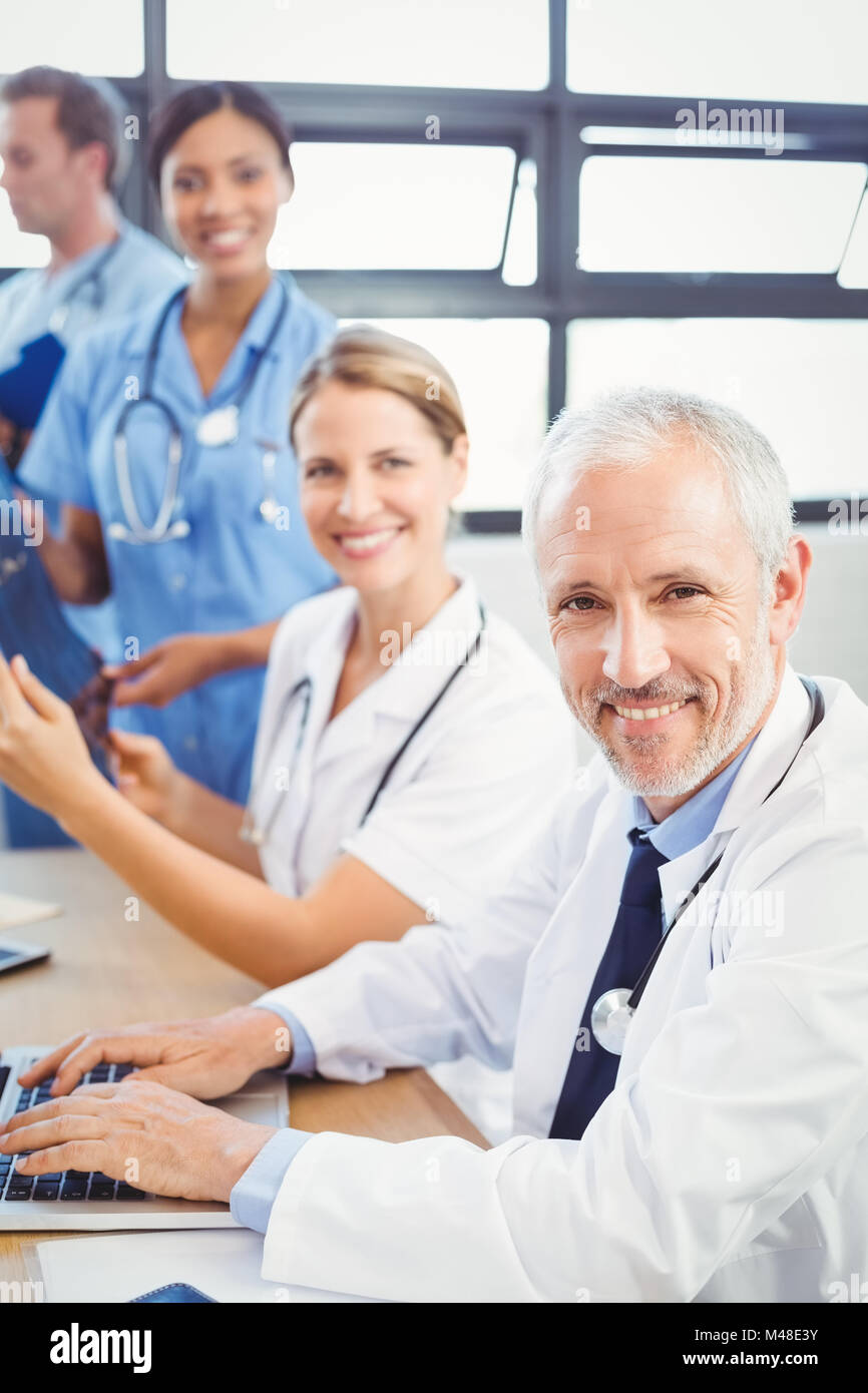 Portrait of medical team smiling in conference room Stock Photo Alamy