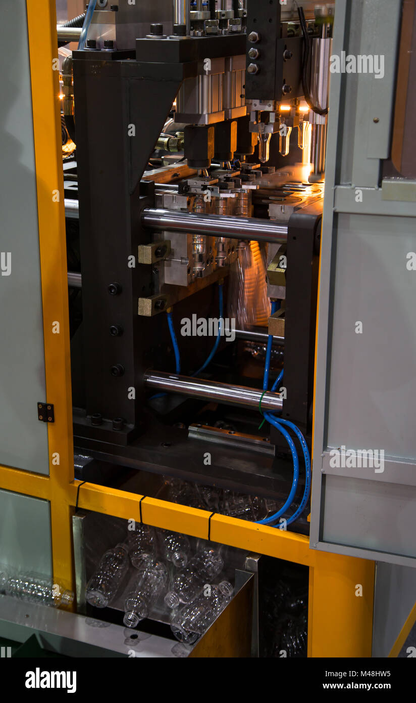 Heating process for plastic bottle blowing machine Stock Photo Alamy