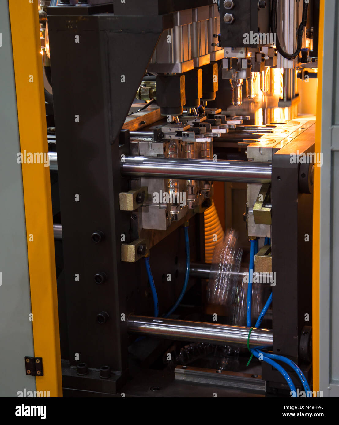 Heating process for plastic bottle blowing machine Stock Photo Alamy