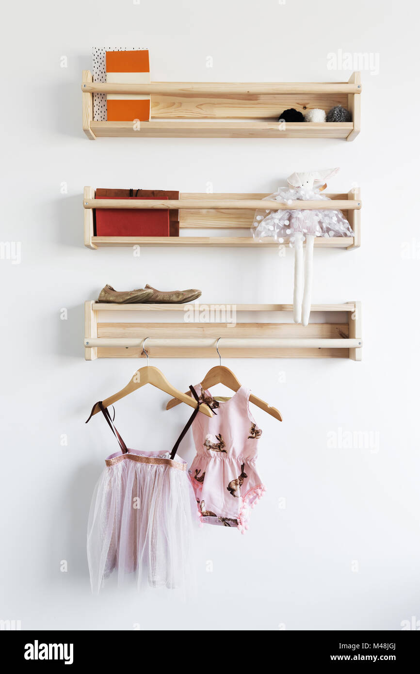 Pretty toys shelf storage in a young girls bedroom Stock Photo