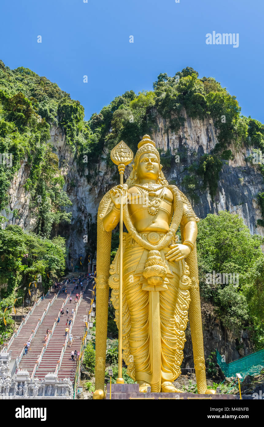 Kuala Lumpur, Malaysia - February 13 , 2018: Batu Caves is a limestone hill that has a series of caves and cave temples in Gombak,Malaysia. People can Stock Photo