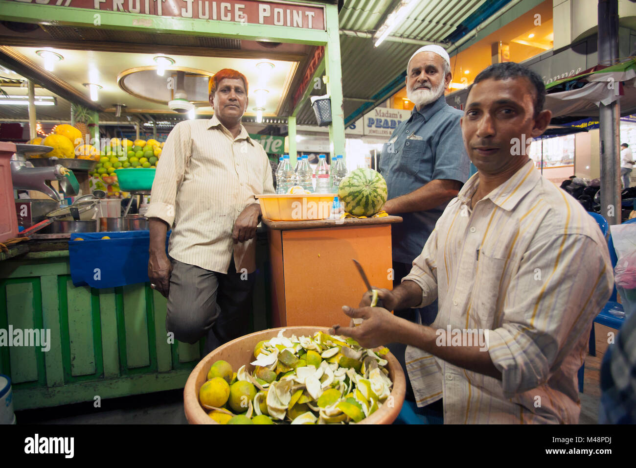 People selling fruits, fruit juices and other thing in Charminar