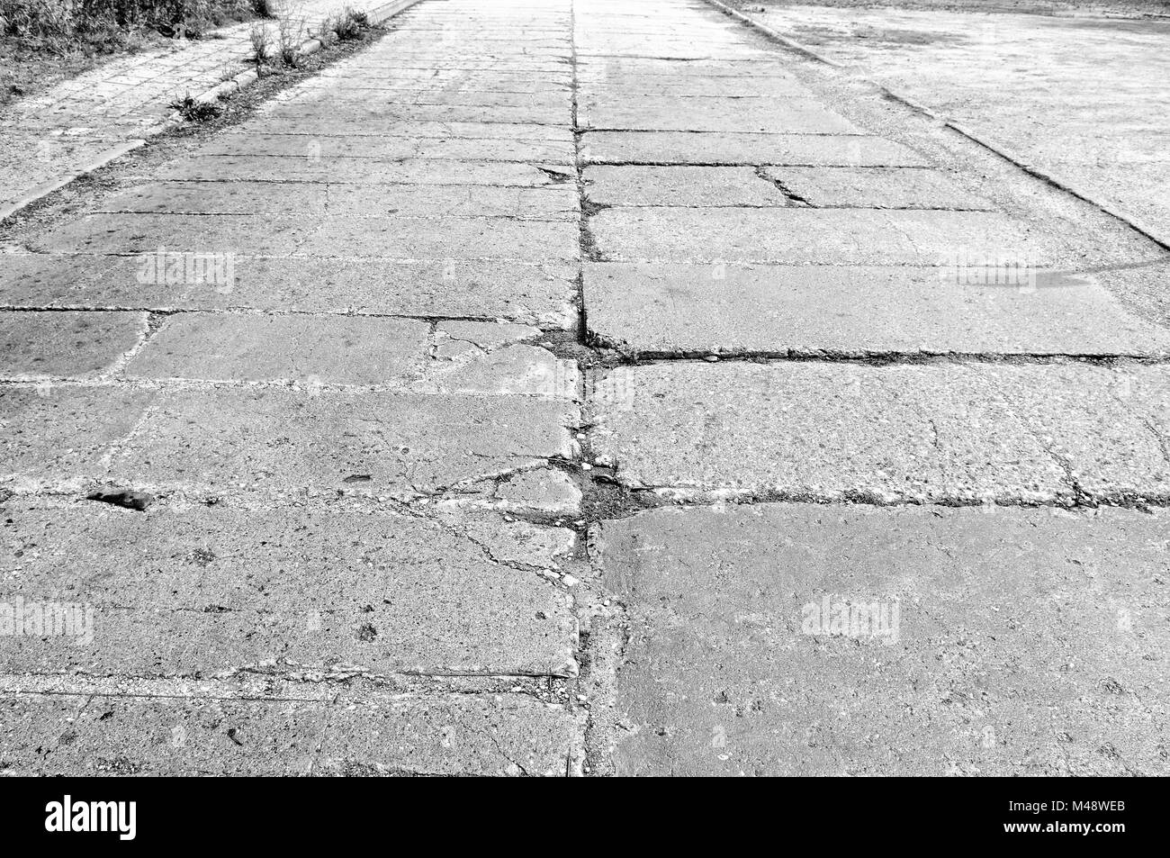 old GDR concrete roadway condition black and white Stock Photo