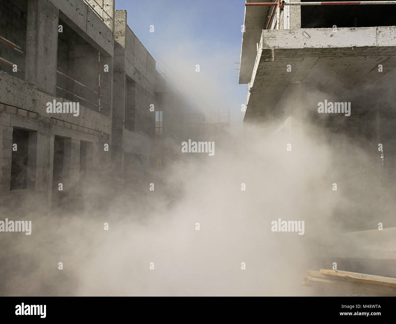 Construction Dust in the air Polluting the environment Stock Photo