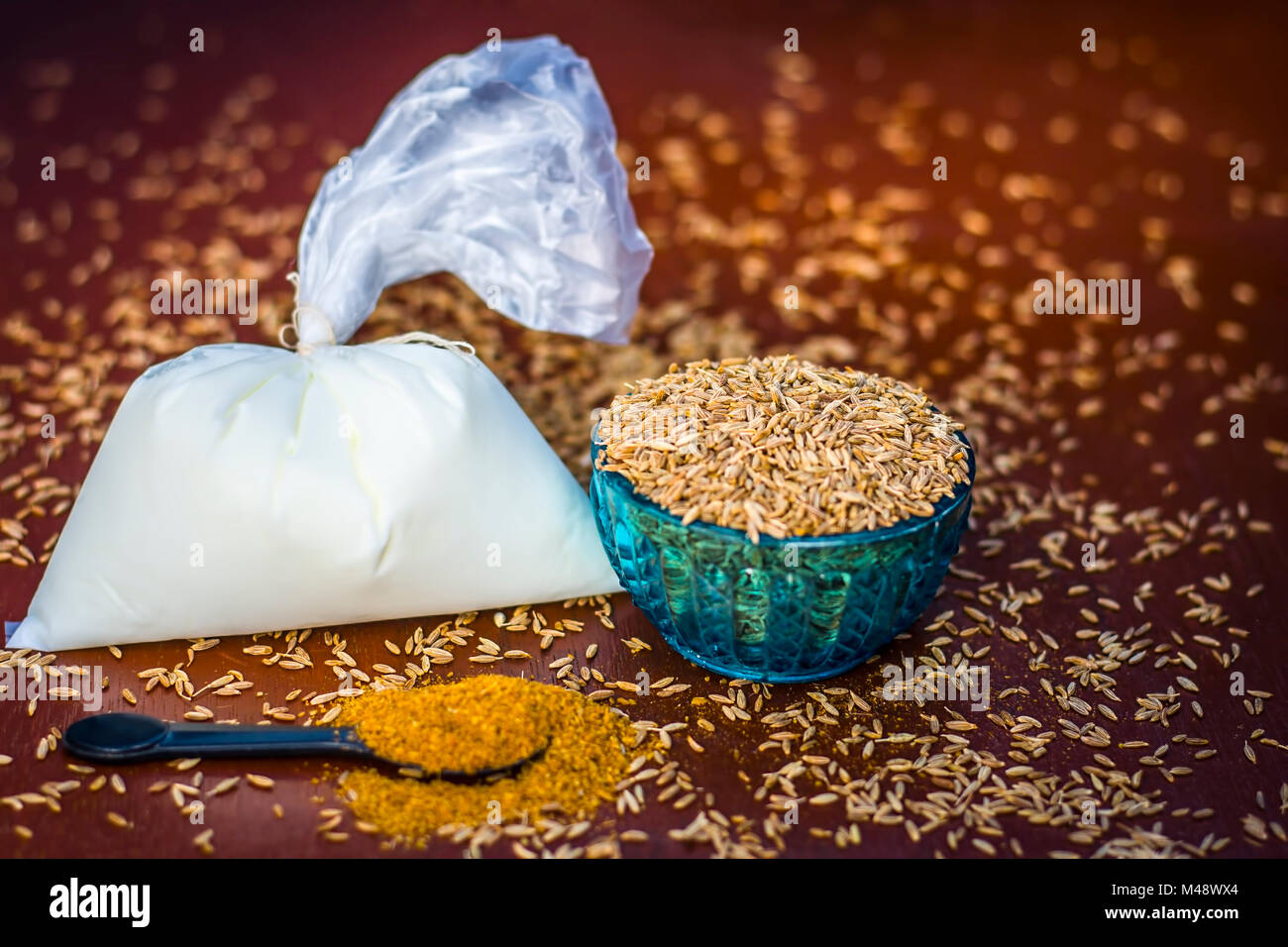 Close up of ingredients of ayurvedic treatment of stomaches i.e.cumin