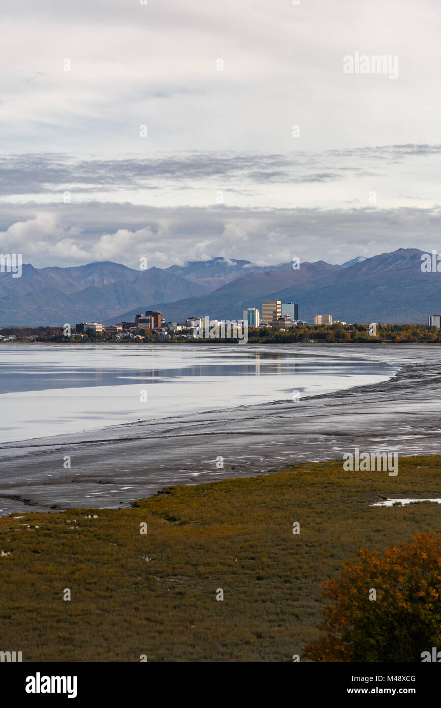 Downtown Anchorage Skyline and Chugach Mountains from Earthquake Park Stock Photo