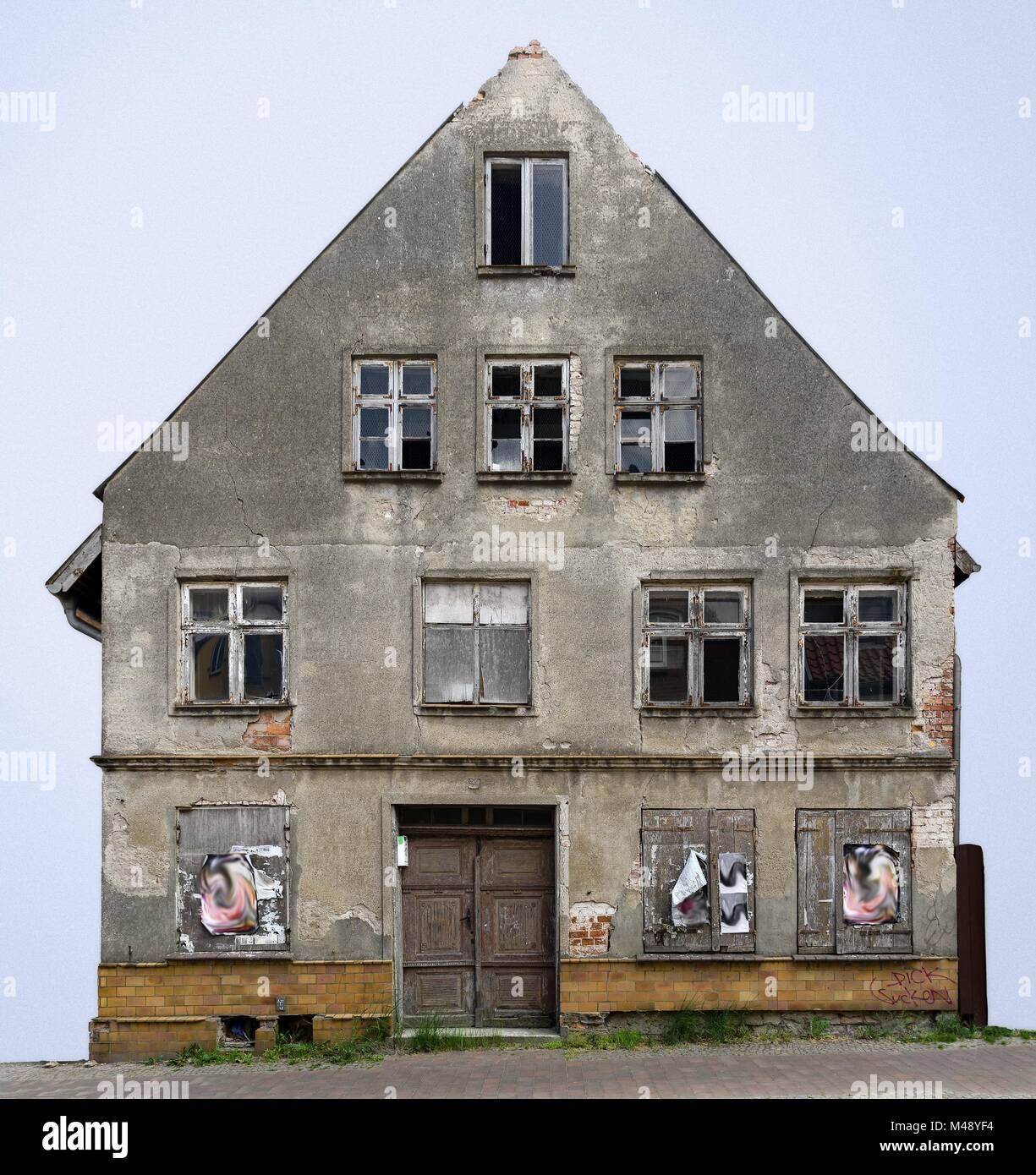 gable side of an unpeopled desolate old house Stock Photo