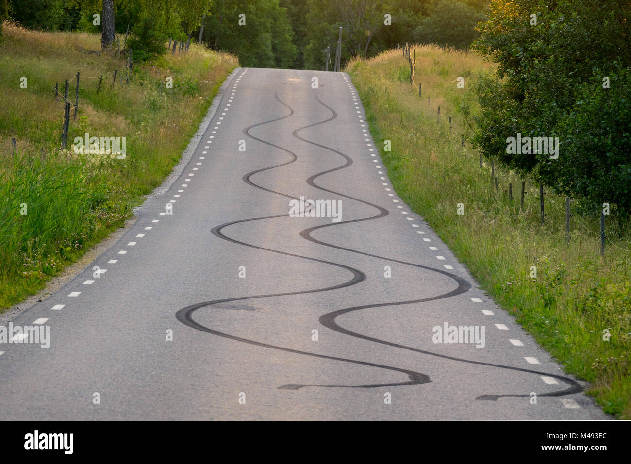 Skid marks on a road Stock Photo - Alamy