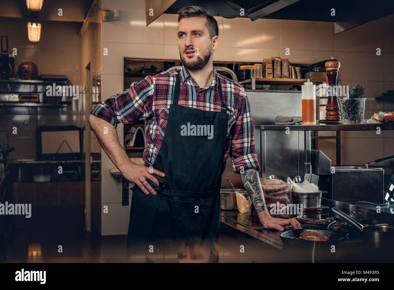 Cook Photo Portrait Portrait of stylish cook on a kitchen Stock Photo - Alamy