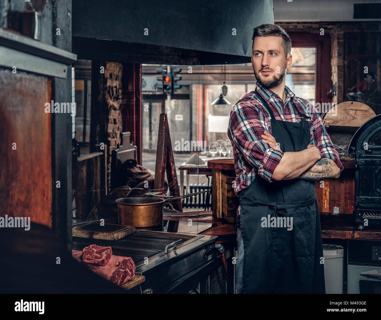 Cook Photo Portrait Portrait of stylish cook on a kitchen Stock Photo - Alamy