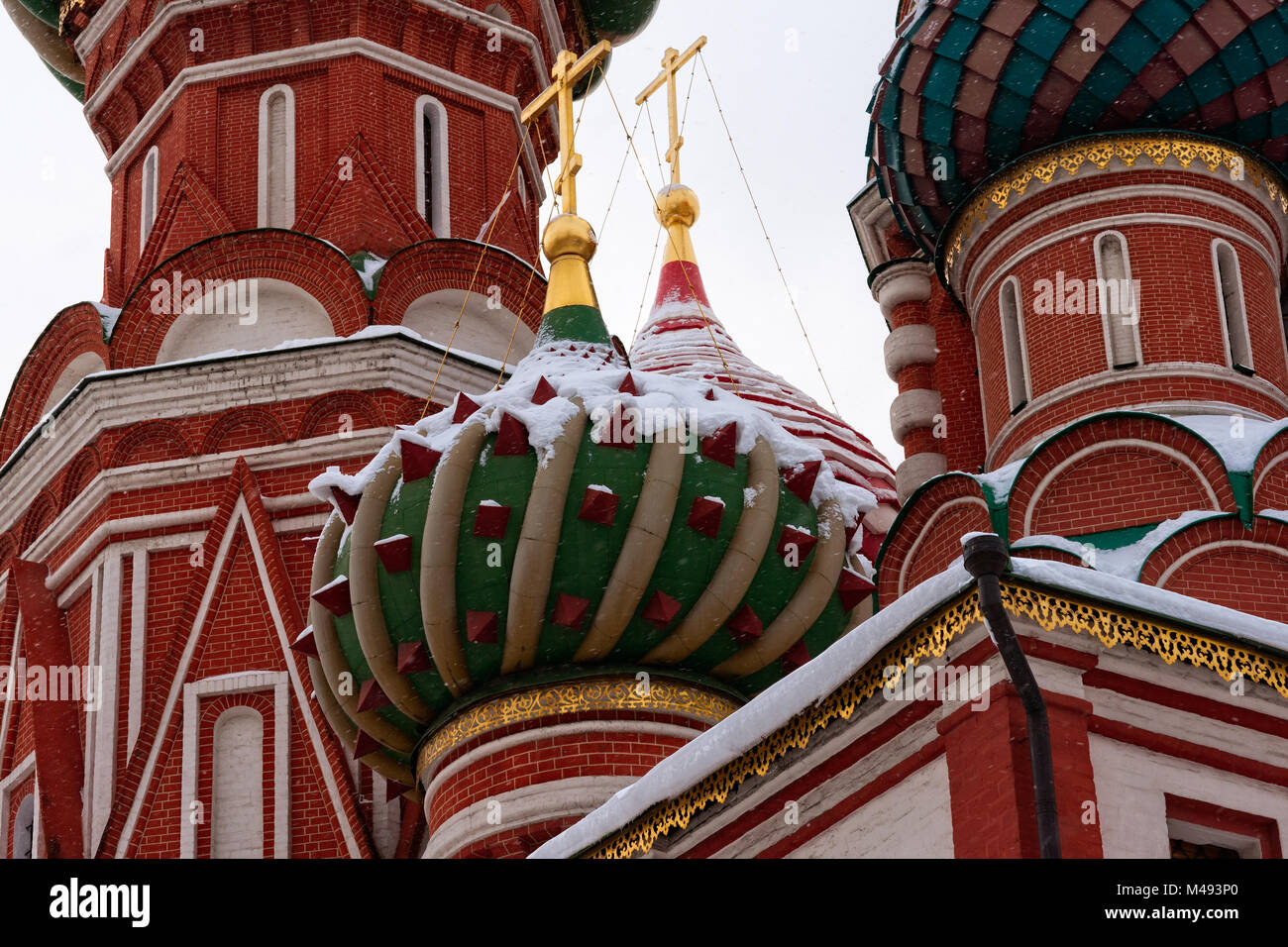 Saint Basil cathedral domes. The green dome in the center marks the sanctuary and the burial place of the Basil, Vasily, the Blessed Stock Photo