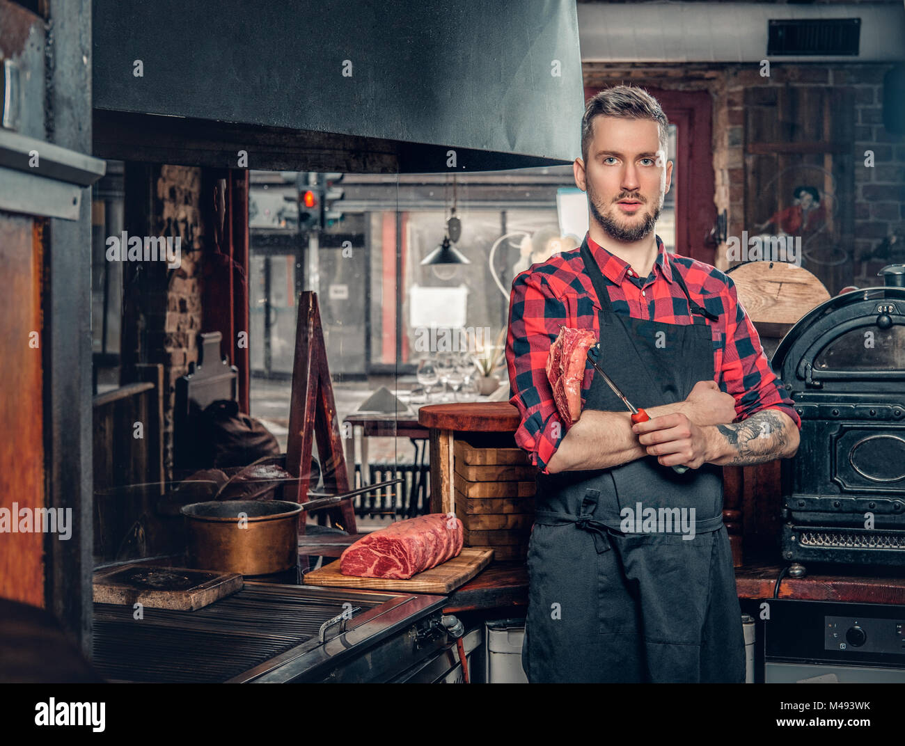 Cook Photo Portrait Portrait of stylish cook on a kitchen Stock Photo - Alamy
