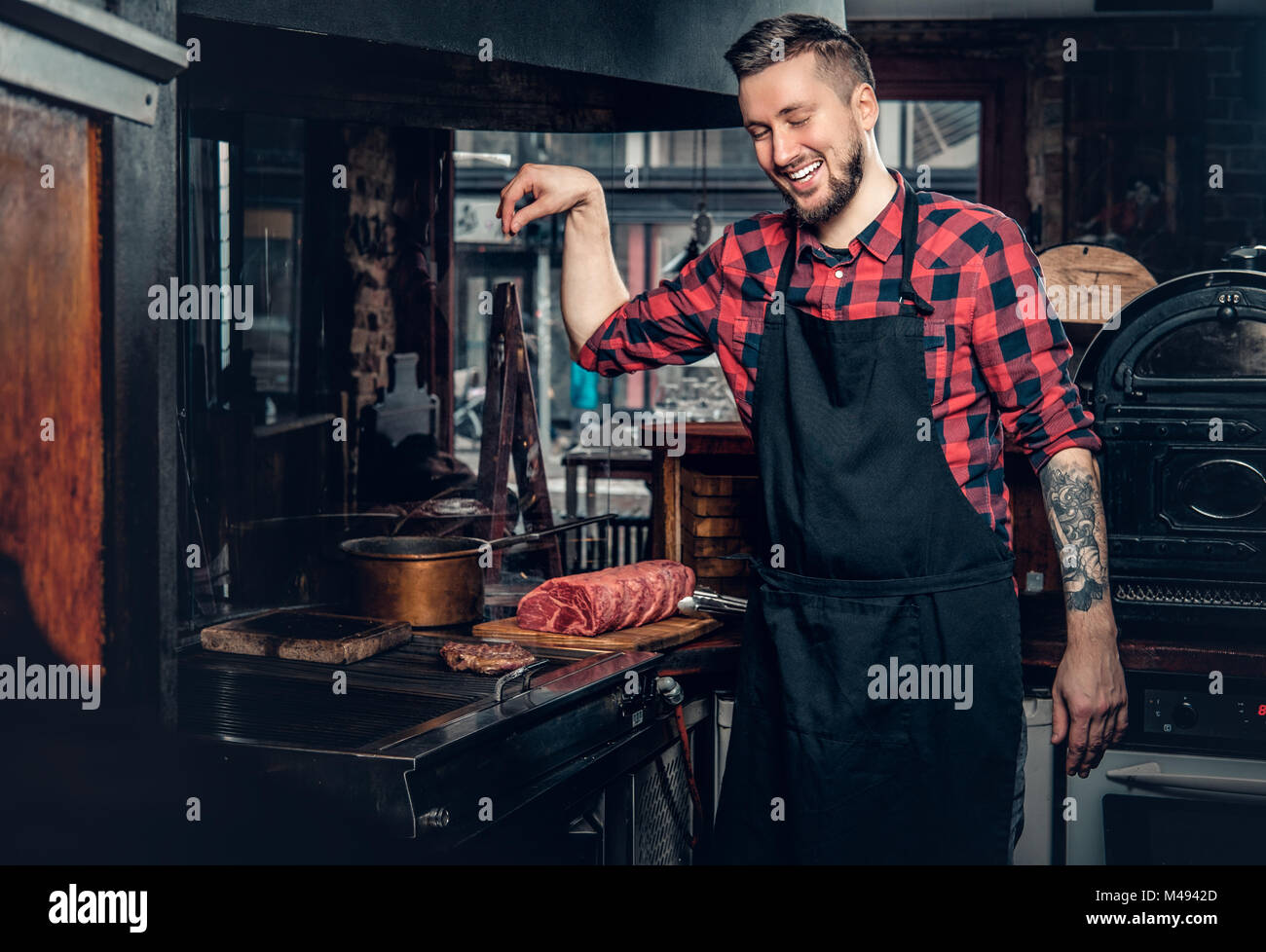 Cook Photo Portrait Portrait of stylish cook on a kitchen Stock Photo - Alamy