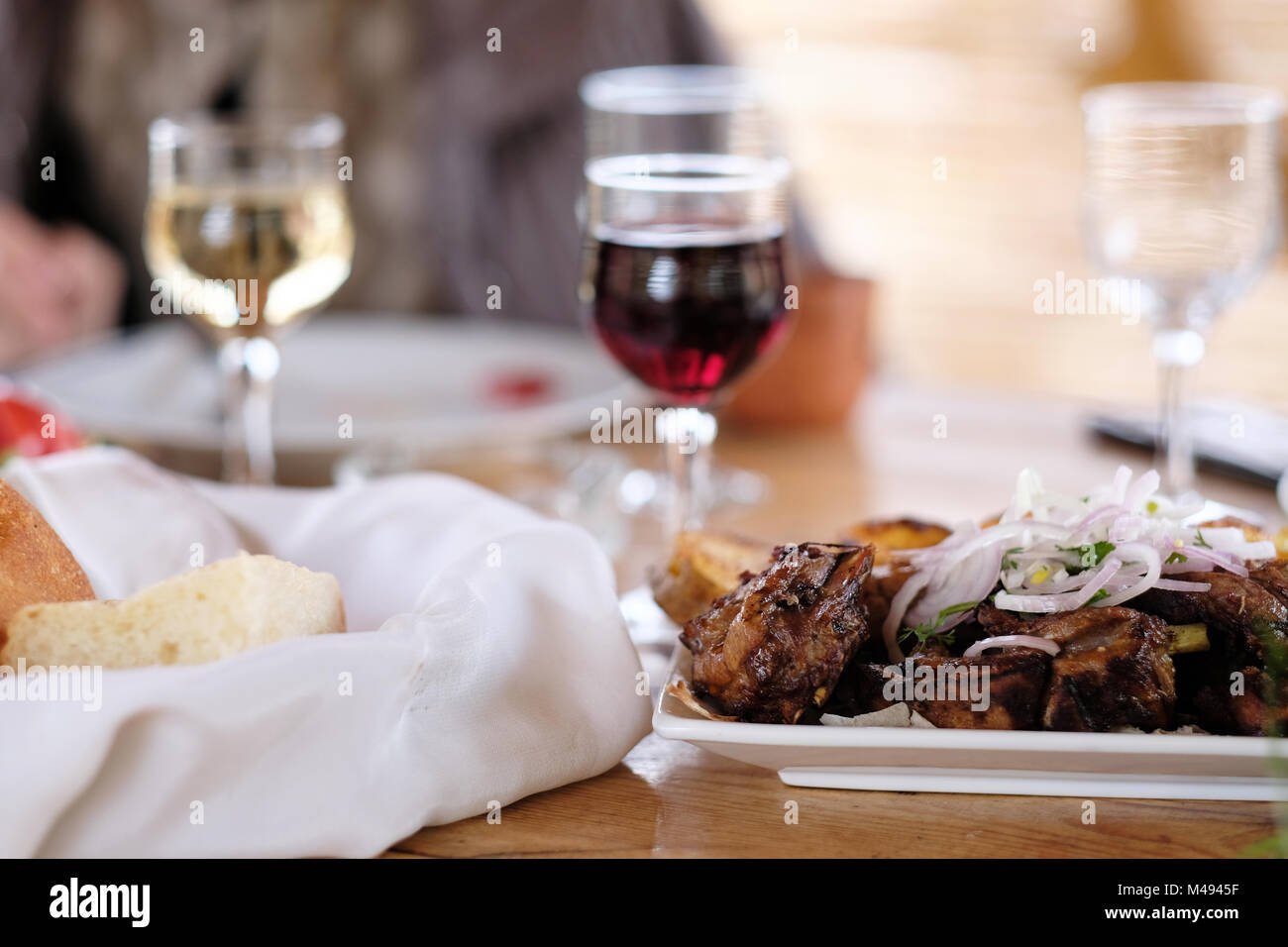 Kebab with glass of wine Stock Photo Alamy