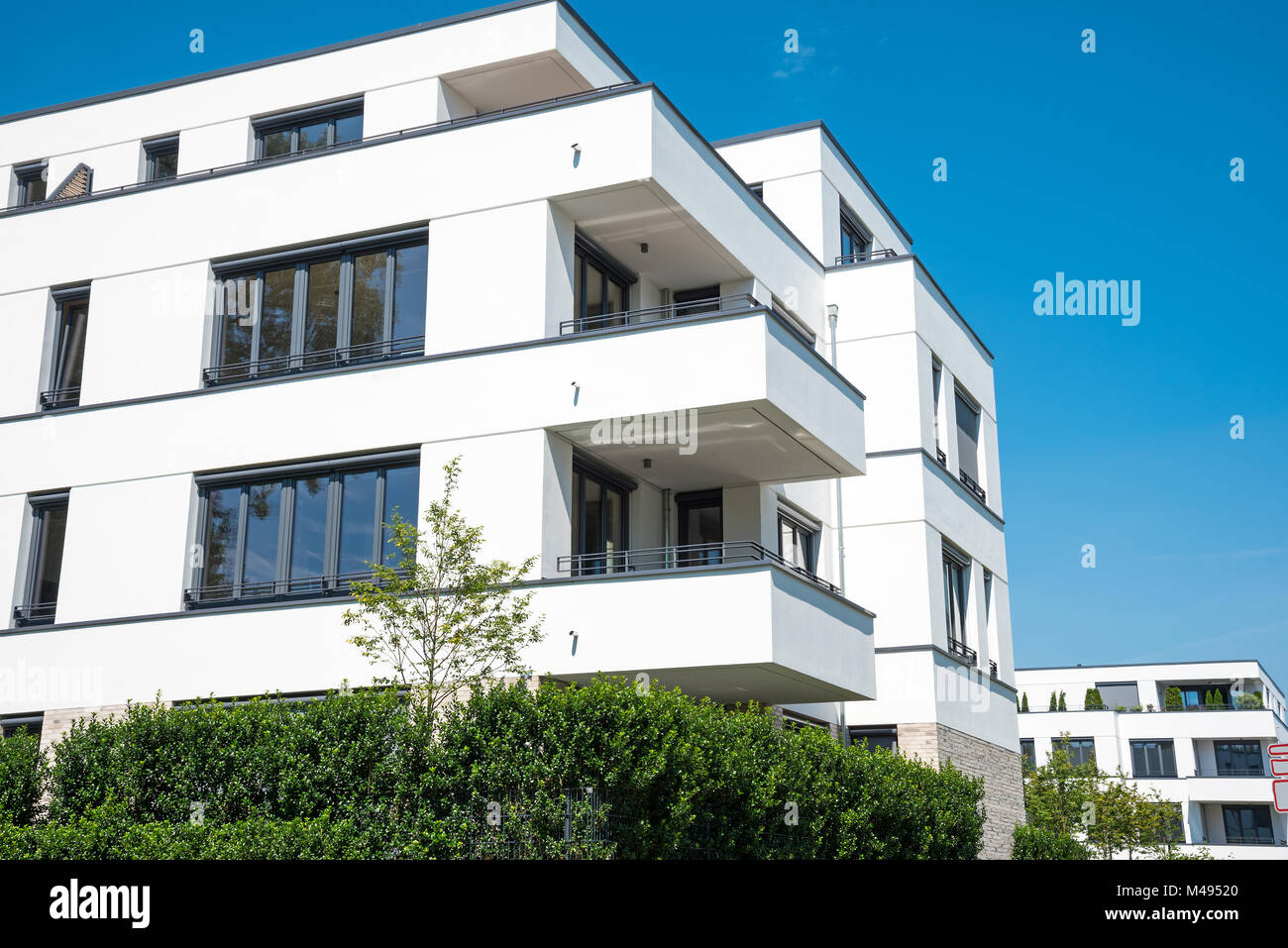 New white apartment house seen in Berlin, Germany Stock Photo - Alamy