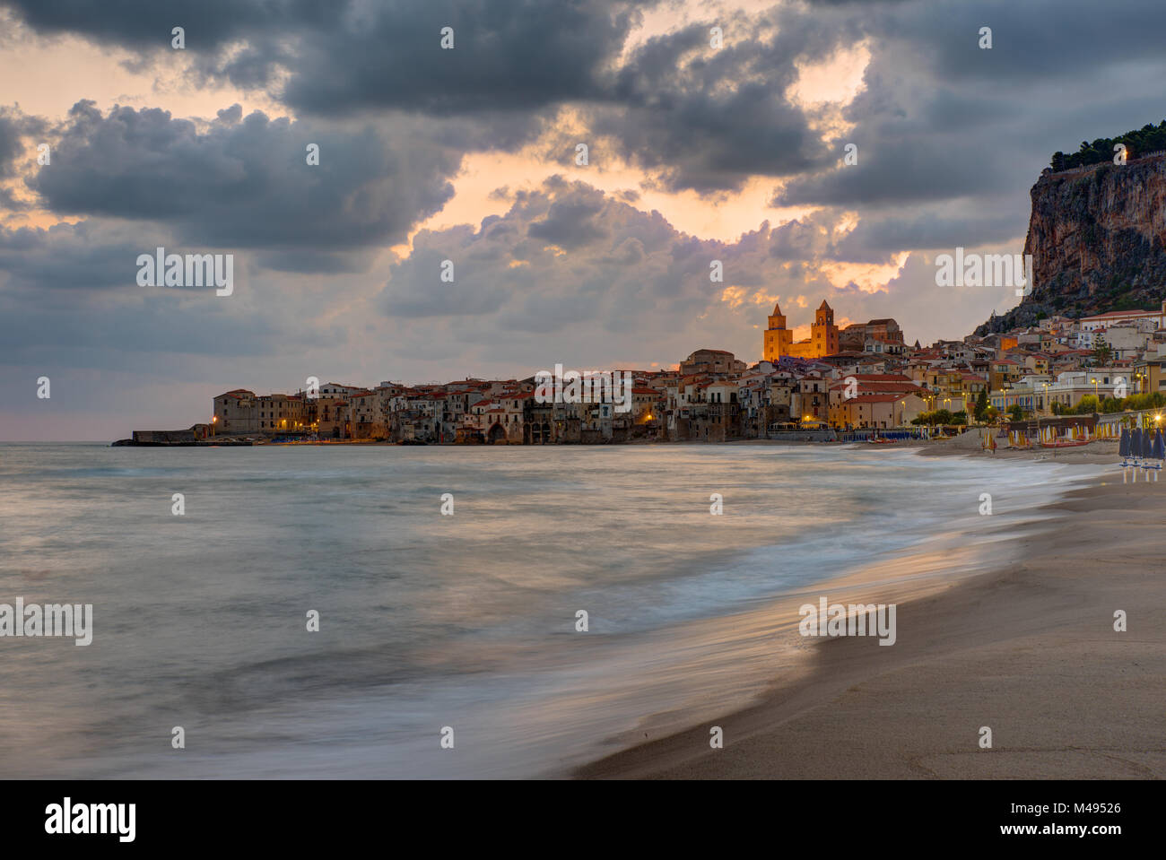 The beach at Cefalu in Sicily before sunrise Stock Photo