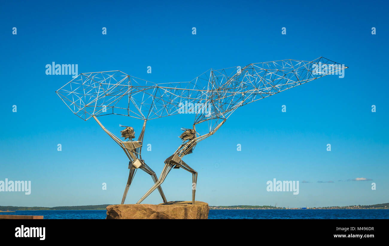 Fishermen sculpture on Onega lake embankment, Petrozavodsk, Russia Stock Photo