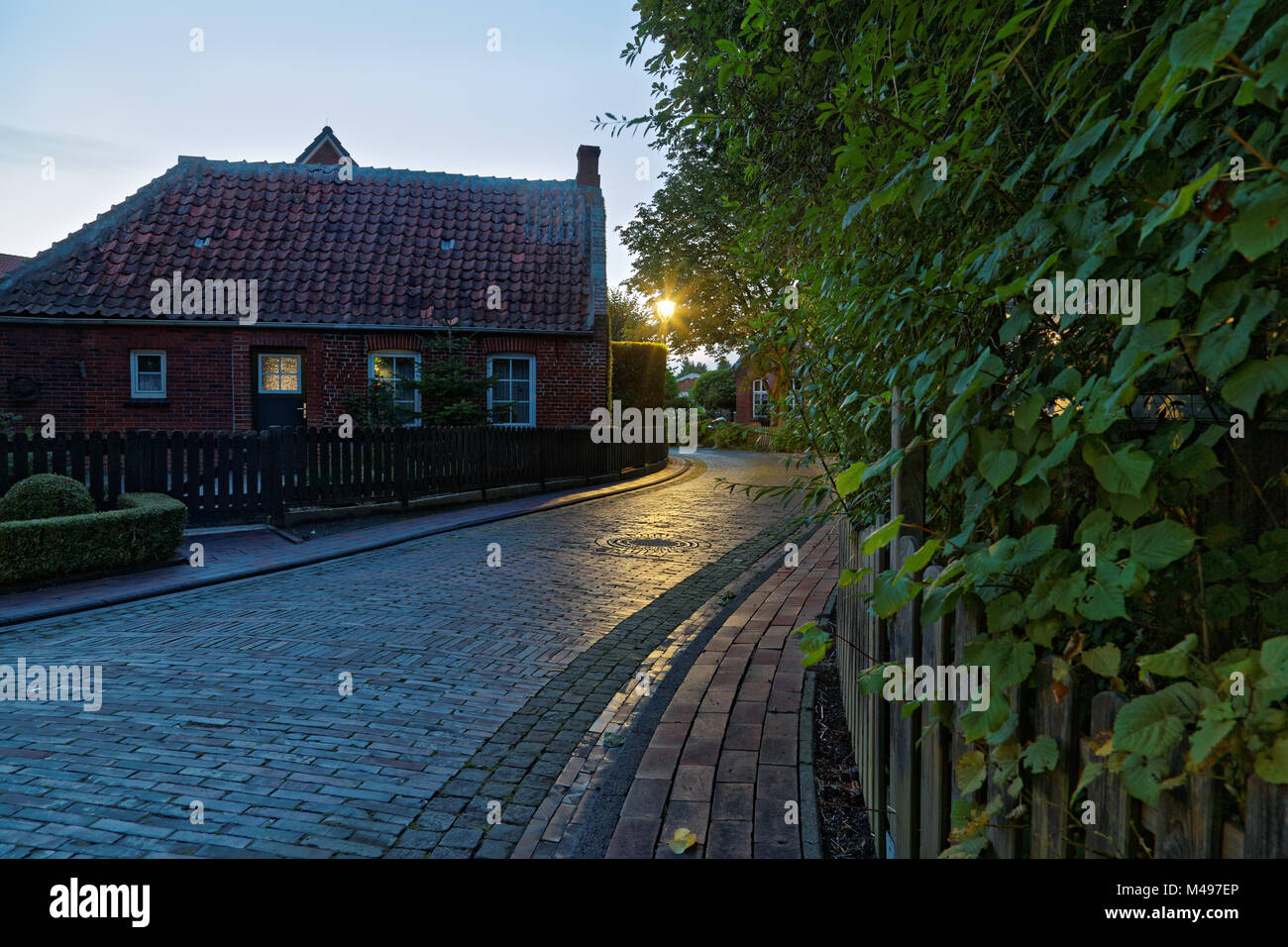 Evening in Rysum, a Warf village in East Frisia Stock Photo