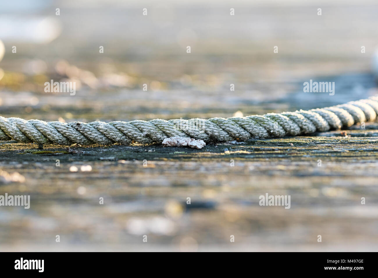 Rope on jetty Stock Photo - Alamy