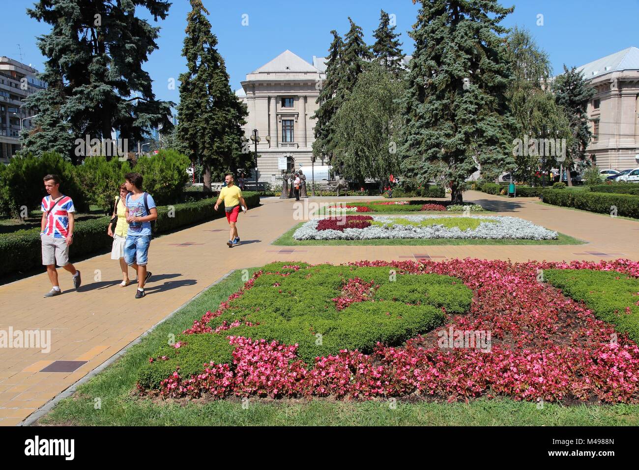 PLOIESTI, ROMANIA - AUGUST 20: People visit city park on August 20, 2012 in Ploiesti, Romania. Ploiesti is the 9th largest city in Romania and exists  Stock Photo