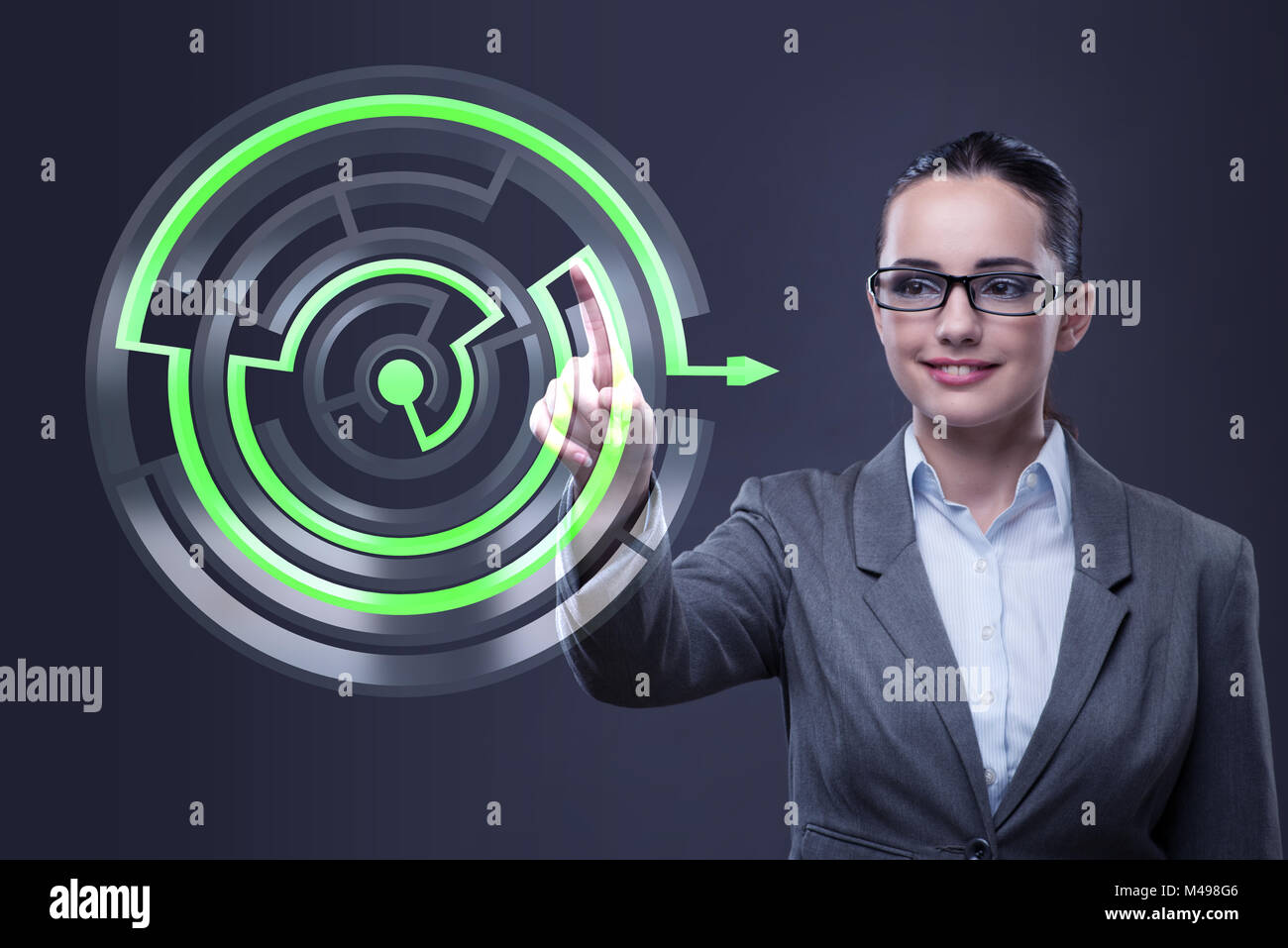 Businesswoman with maze in difficult situations concept Stock Photo - Alamy