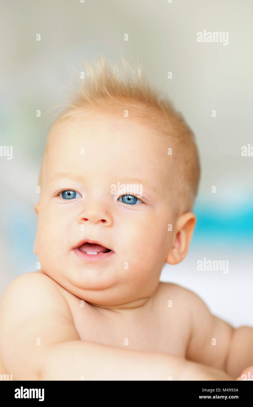 Baby boy with blue eyes Stock Photo Alamy